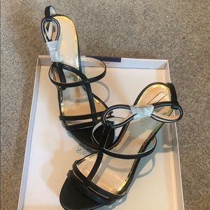 Brand new never worn 9.5 strap heels